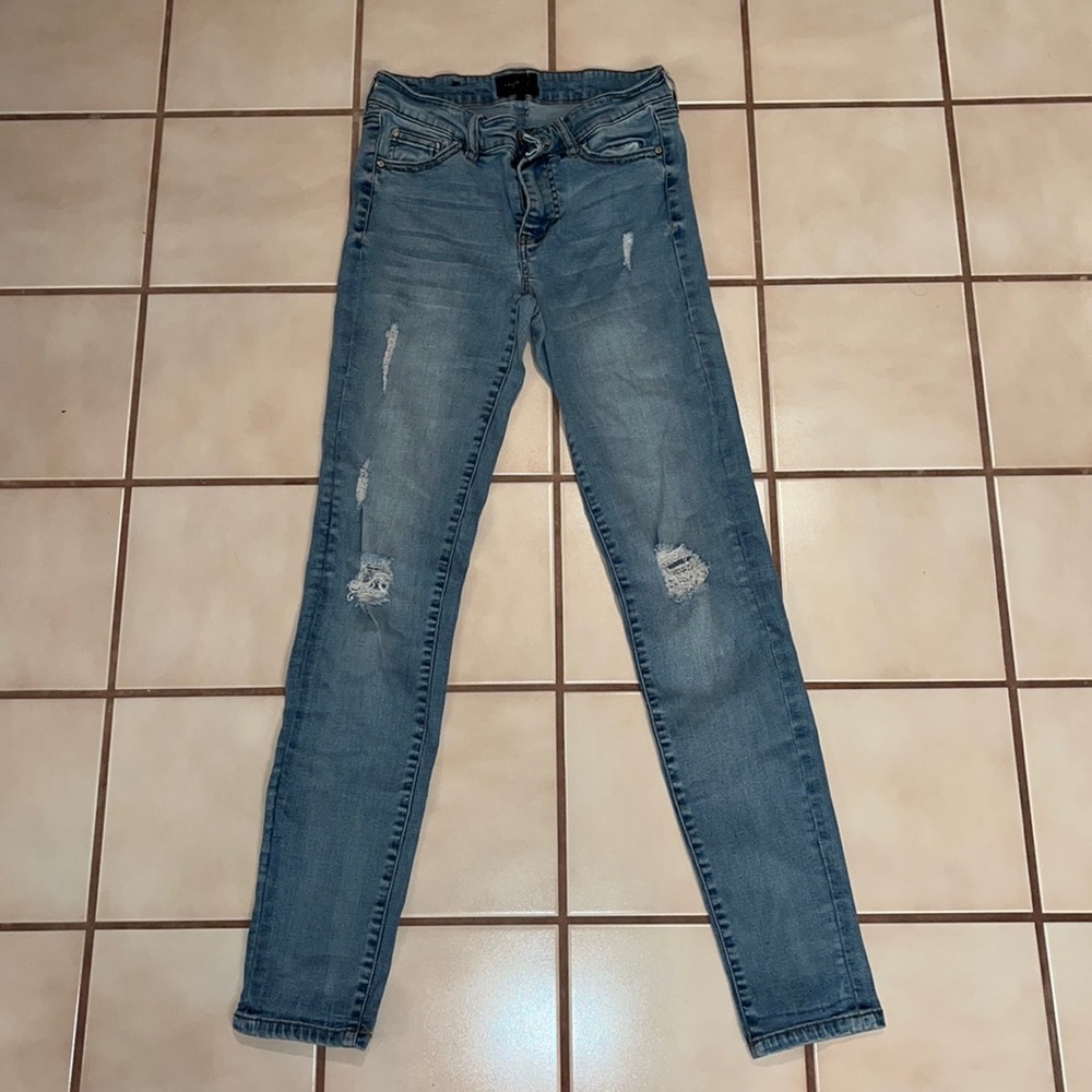 Medium Denim mid rise Ripped Skinny Jeans